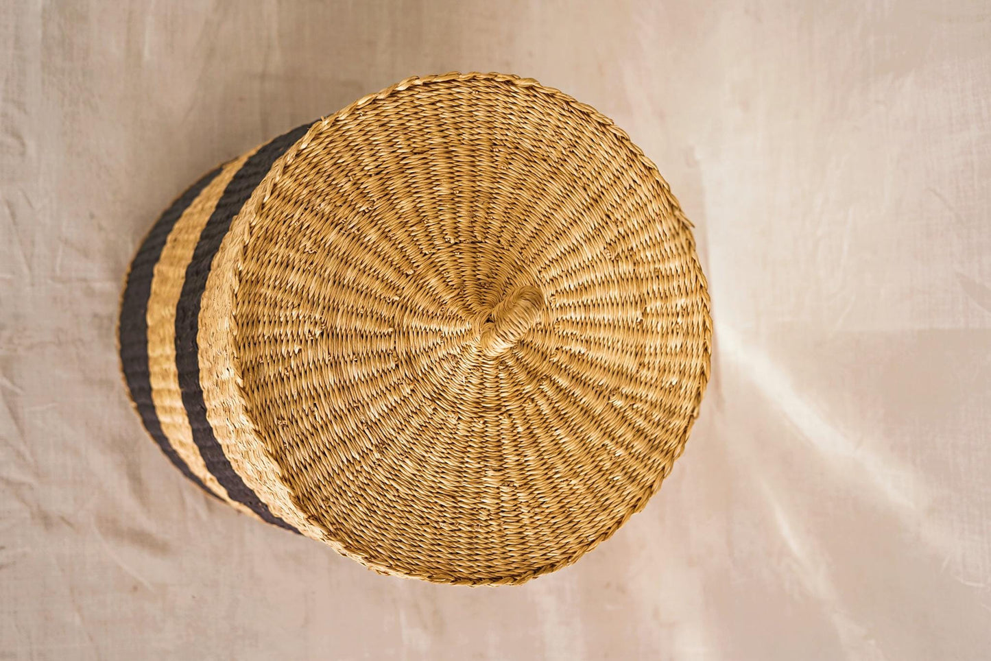 Woven basket on a textured surface