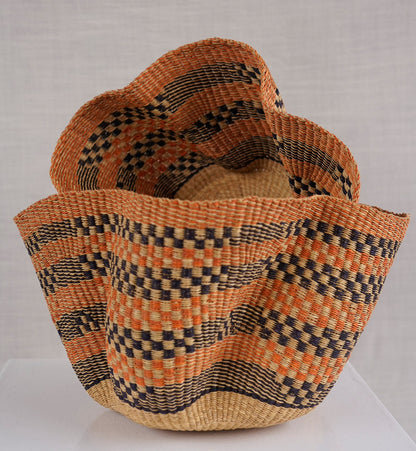 Woven basket with a geometric pattern on a beige background